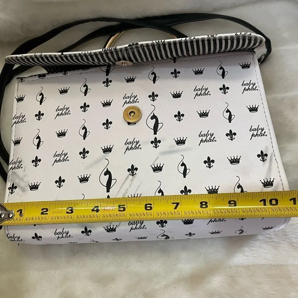 Baby Phat black and white logo satchel/shoulder bag with gold tone accent.